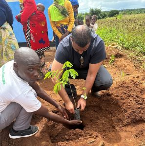 Our Managing Director, Keval, planting a tree in Malawi with Tearfund c. April 2023